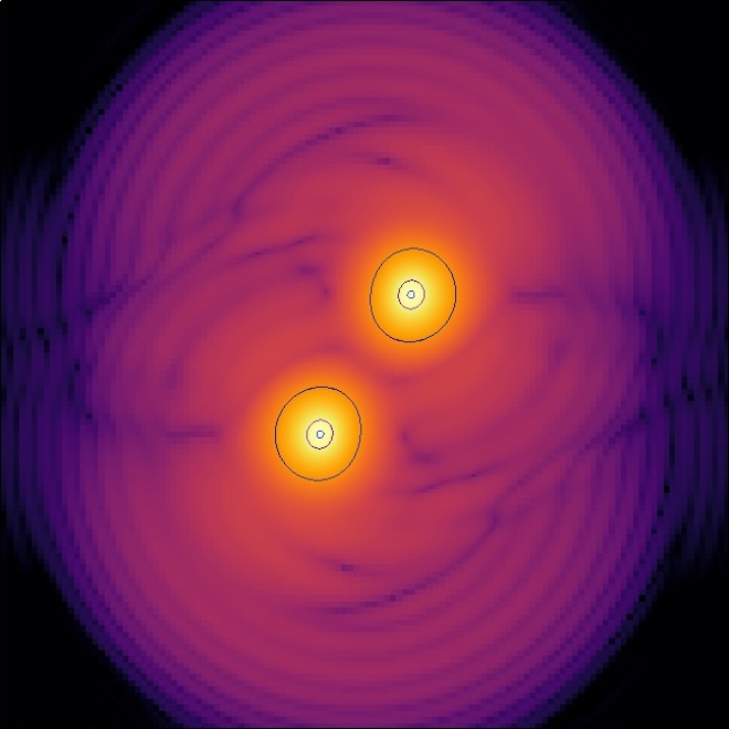 Snapshot from the numerical simulations of boson stars spiralling around each other and then merging.